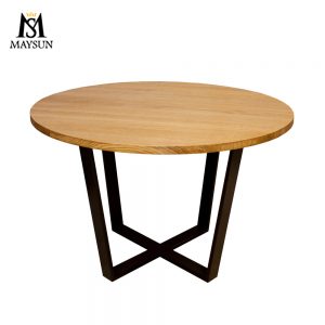 Round table with black iron base and oak in Nordic style